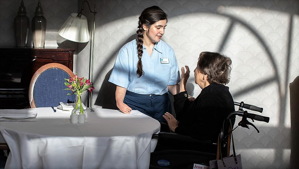 Susanna Bannister interior shot with resident 