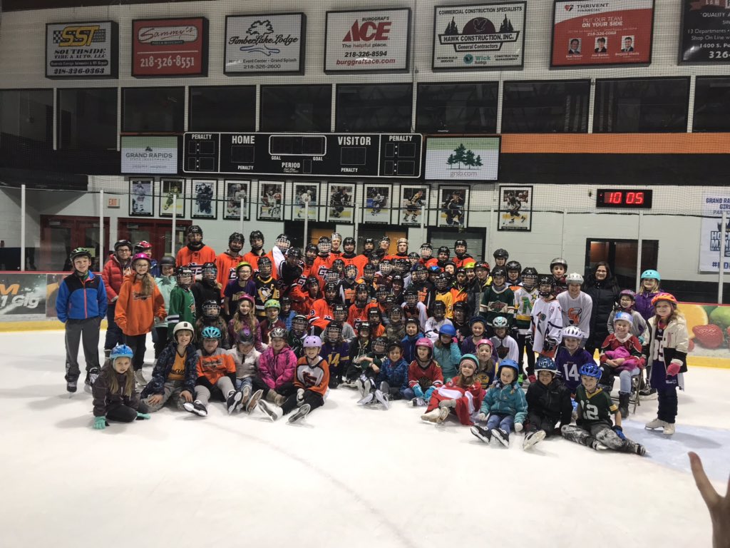 GRhockeyHS's tweet photo. Volunteering today with local elementary students. Great way to get in some warmups for tonight’s game at Brainerd! #whyweplay #SticksOutForMarshall https://t.co/iHcleGnC7n