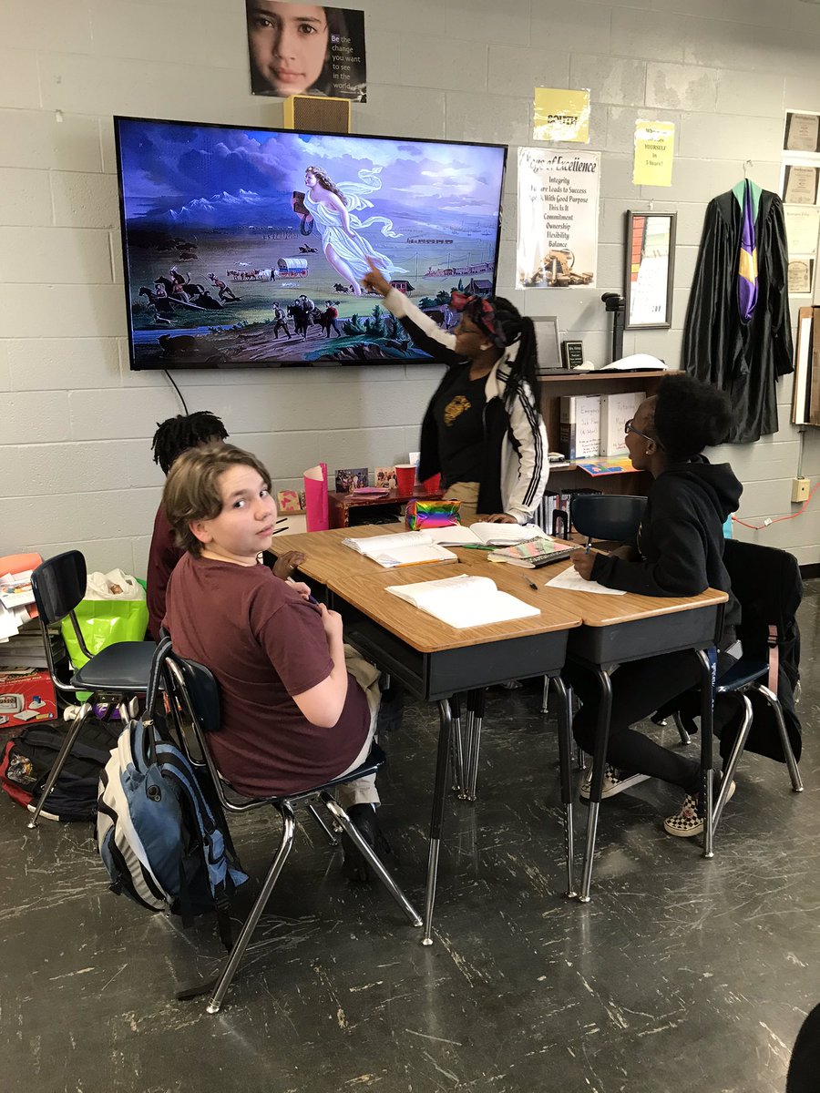 Heintzhistory's tweet photo. Henry Enerson, my Project Inspire Resident, engaging students with a primary source document - Painting “American Progress”. #HCS_SocStudies #engaged #primarysources #OneTyner #Tyner #ManifestDestiny https://t.co/TBWuMLhqzi