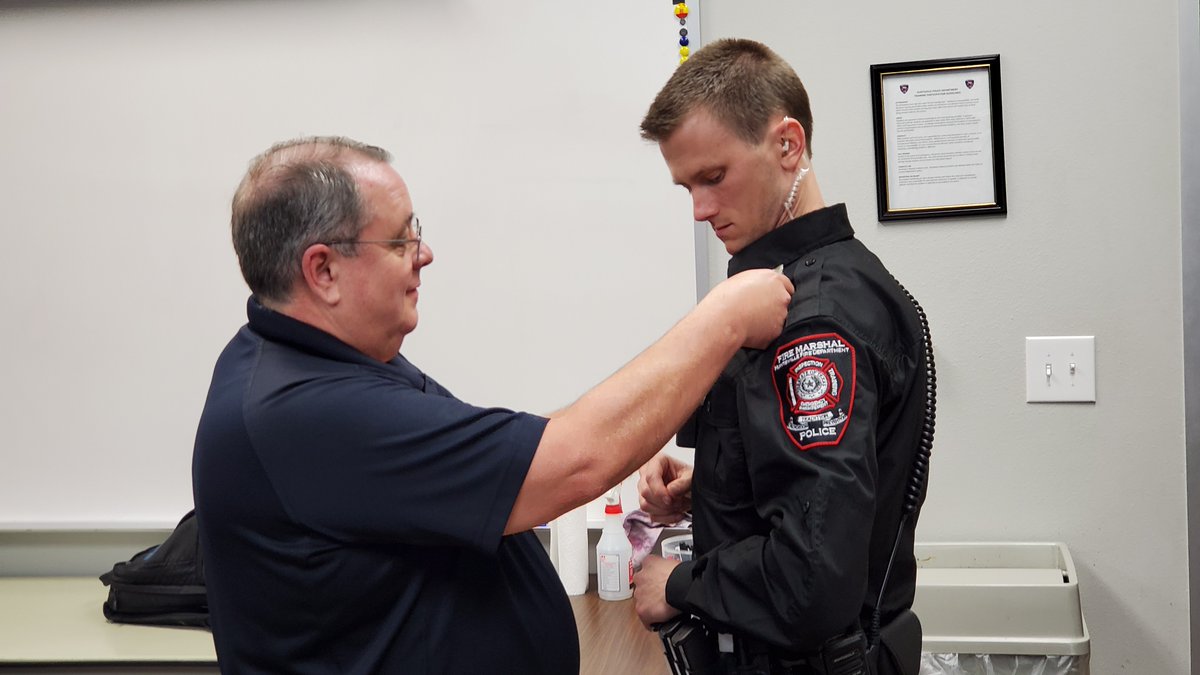 HuntsvilleTXPD's tweet photo. Today marks a historic and very special day for emergency services in Huntsville and Walker County. HFD CPT Darren Parker was sworn in this afternoon as the city's first TCOLE certified Fire Marshall. His commission will be carried by Huntsville Police Dept. https://t.co/MNx5vhGHC2