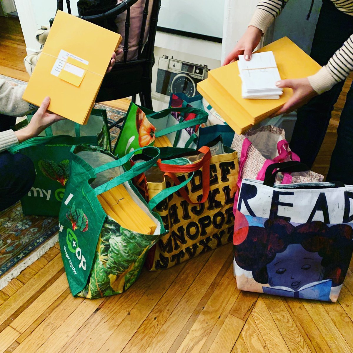 PS10Brooklyn's tweet image. Committee members hold the annual packet-stuffing party in preparation for PS10’s 2020 Read-a-thon. Get ready to celebrate the Magic of Reading with us! #ps10reads