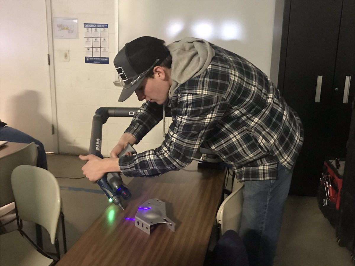 MrsMaxwellOTC's tweet photo. Wyatt is the brave student volunteer to use the portable CMM being demonstrated today. He just measured over 2 million coordinates in a few seconds. Really cool technology for the Center for Advanced Manufacturing. @OTCedu @OTC_CAM #myOTC #PrecisionMachining #DraftingDesign https://t.co/jWZsAQctkg