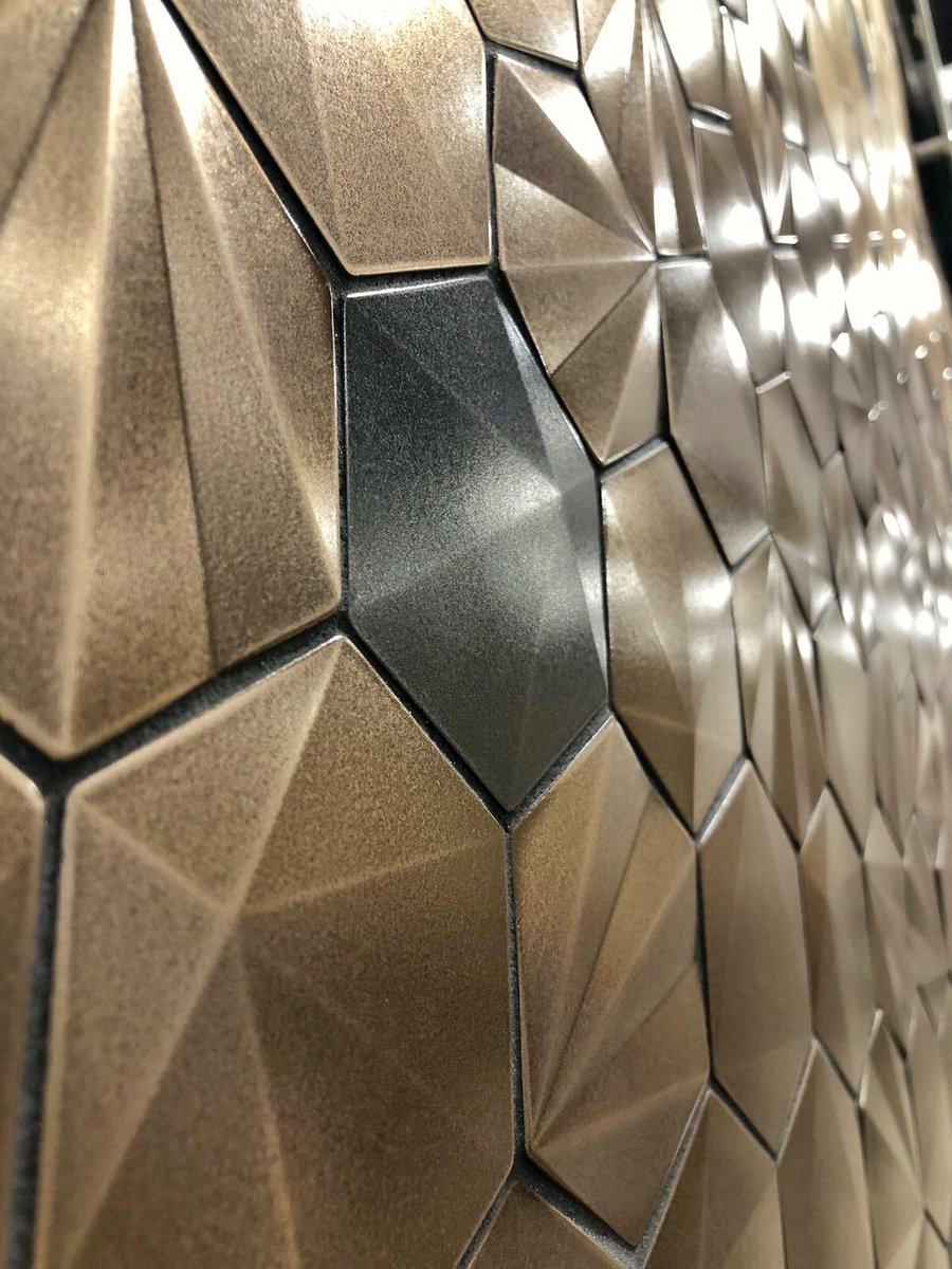 Marazzi_USA's tweet photo. Everyone is talking about Geometal, another new collection we’re previewing at @tiseevents. With its 3D effects, multiple patterns and stunning metallic colors, waiting for its spring release won’t be easy! #TISE2020 #MarazziUSA #tile #Surfaces2020 https://t.co/0yzB8YqlF9