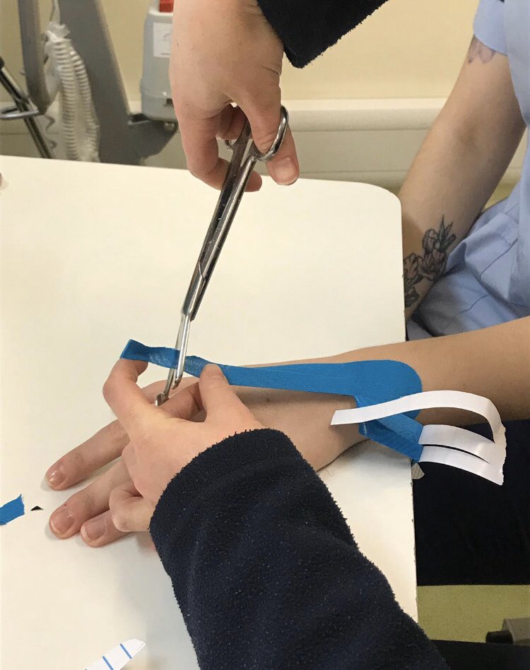 SCO__OT's tweet photo. A great inservice training today - learning about the use of kinesiology tape for oedema management and muscle activation. We even got to have a go on some of our therapy colleagues. Do any of you use kinesiology taping regularly in your practice and have a story to share? 🤓✂️ https://t.co/3eYYQxpl8R