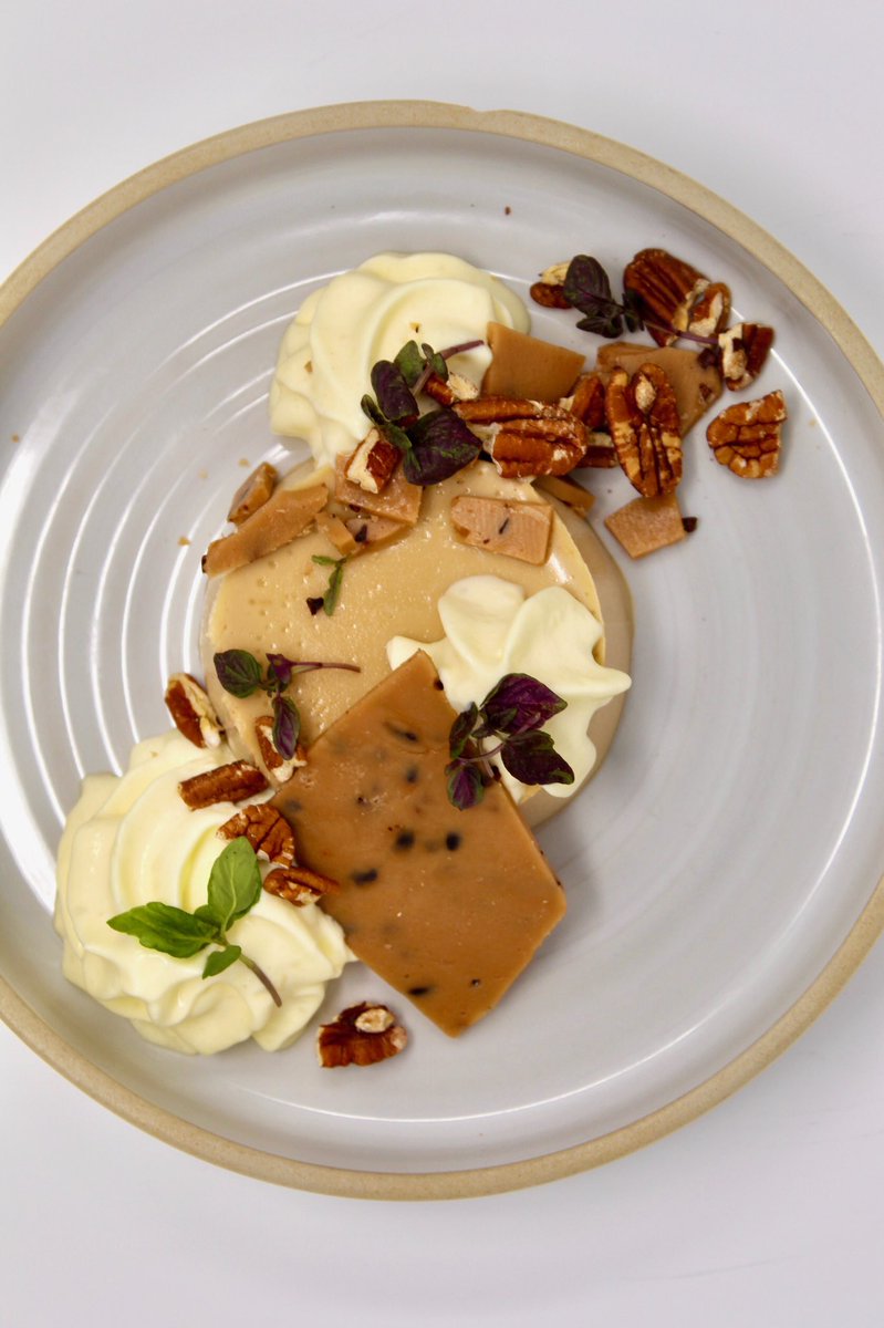 Playing with the sweetness of #butterscotch and the saltiness of white miso, this #pannacotta is the perfect #dessert to end your meal. We serve this panna with a foam made out of #candycap mushrooms, which smell and taste like maple syrup when they’re dehydrated.