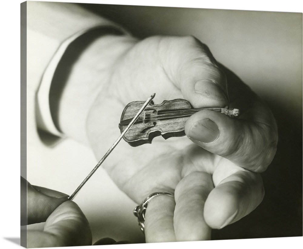 A really really tiny violin. No, tinier than that.