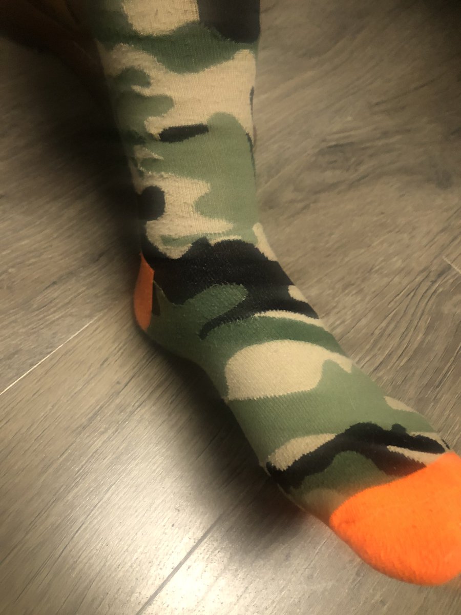 WalterReports's tweet photo. Today’s #sockwar with @BUnderwoodWKRC is Camo vs. Hump Day. Who you got? https://t.co/LaYc1FTApp
