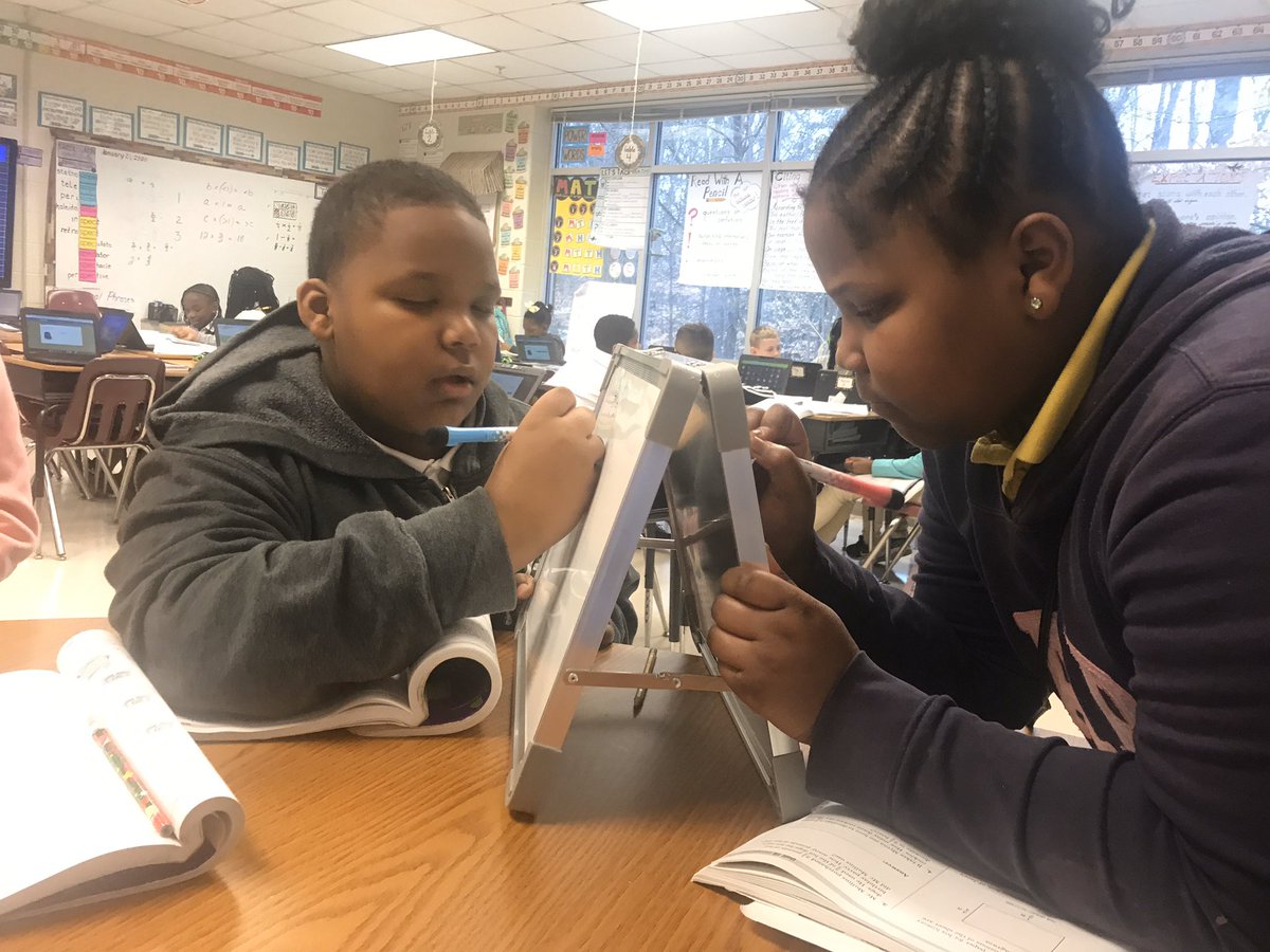 NajulaT's tweet photo. Room 1807 @PeytonForestES 5th grade tigers are actively growing their working vocabulary AND critically thinking while solving math application problems thanks to the generous donors at @DonorsChoose! #PeytonForest @peytonprincipal #believe https://t.co/gmmDNOlALi