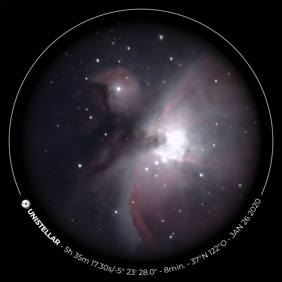 Telescope image of the Great Nebula in Orion, consisting of dust and gas glowing in red, pink, and white.