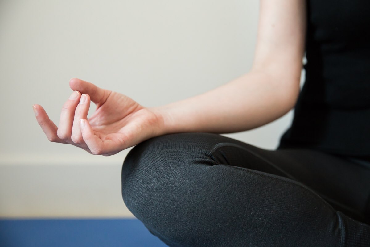Yoga hand on knee