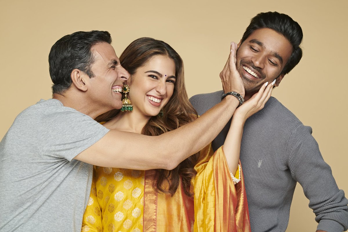 IT'S OFFICIAL... #AkshayKumar, #Dhanush and #SaraAliKhan... Presenting the principal cast of Aanand L Rai's new film #AtrangiRe... Produced by Bhushan Kumar and Aanand L Rai... Music by AR Rahman... Written by Himanshu Sharma... Filming starts on 1 March 2020... Four first looks: