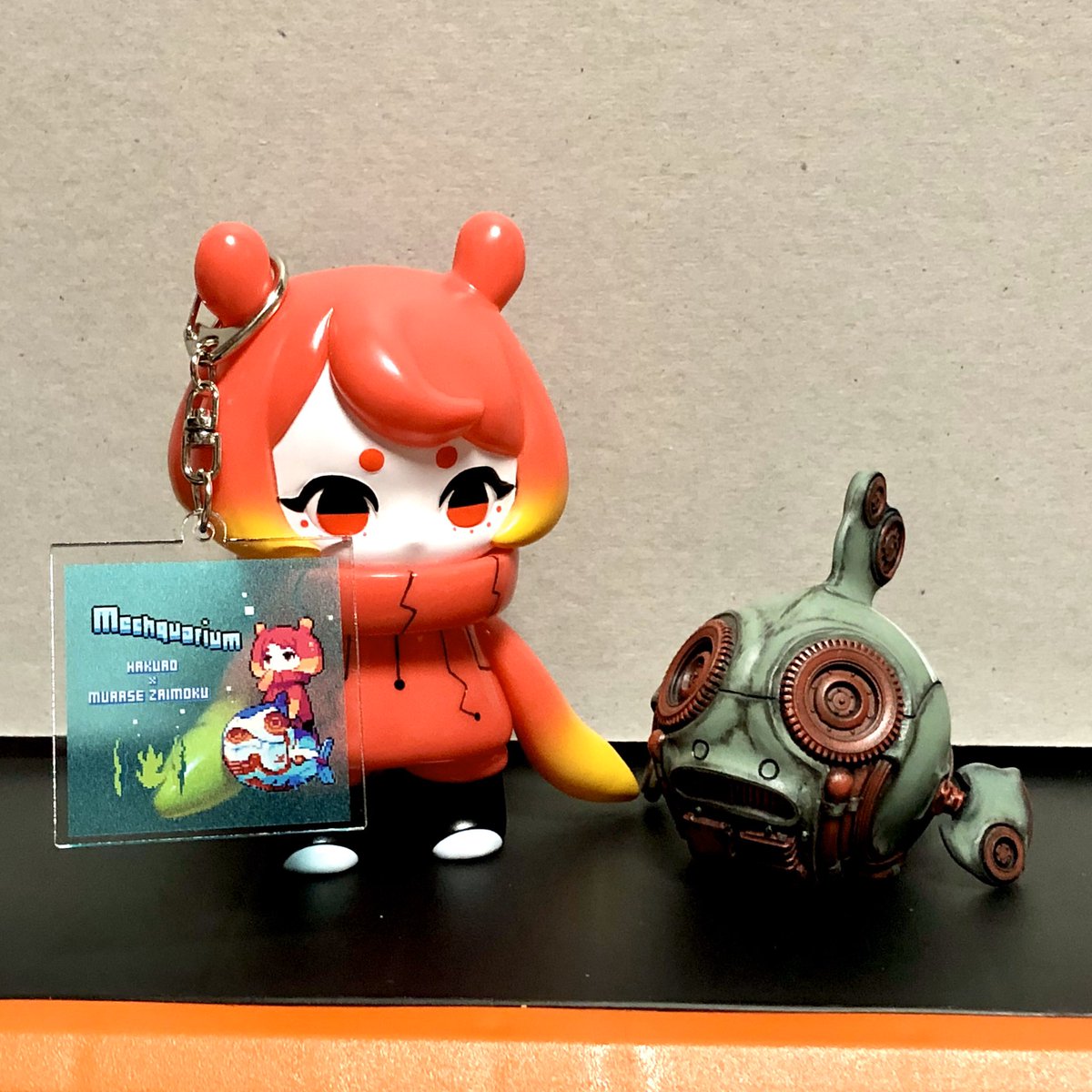 Mechquarium とhakuro個展 ご安全に グッズ紹介 Mechquariumアクリルキーホルダー 佐藤清雅さんによるピクセルアートをアクキーにしました 透明な海がとてもキレイ カバンに付けて出かけたくなります 900円 Mechquarium