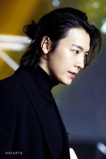 Lee Donghae; his hair might not be that long but he looks so good with a half pony
