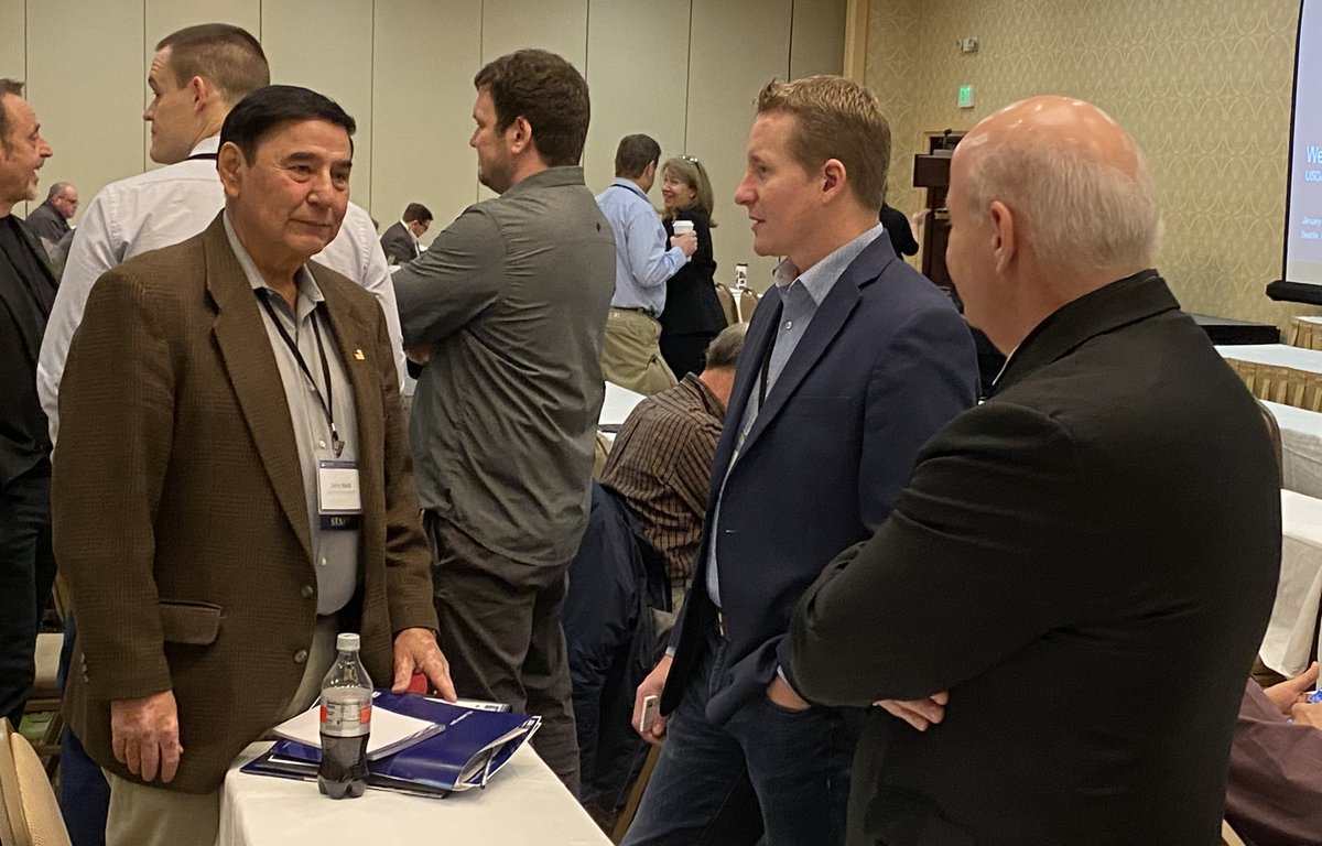 Alaska State Director Jerry Ward talks with Comcast Cable Manager Vincent Buys &amp; <a href="/RD_WA_STATE/">Rural Development WA</a> Director Kirk Pearson before opening remarks on Day 2 of USDA's Broadband ReConnect Workshop in Seattle.