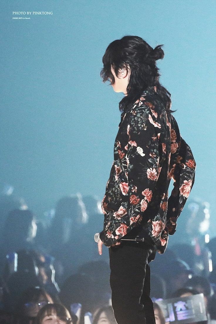 Kim Heechul; his curly hair is just so pretty  (also half ponytail )