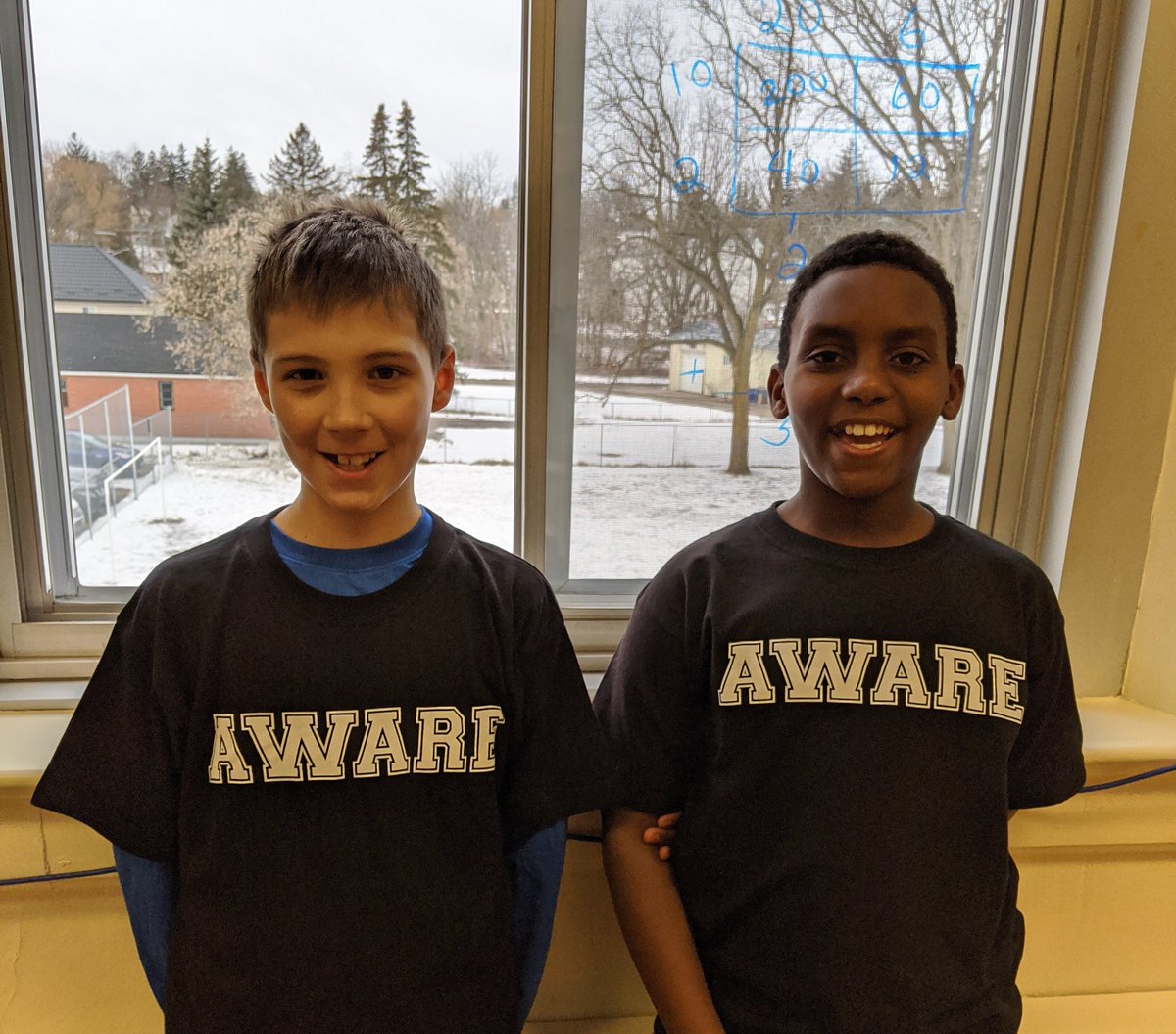 Two great guys supporting <a href="/KidsAbility/">KidsAbility</a> and the AWARE Challenges by wearing their AWARE T-Shirts! Thanks, Ahmed and Lukas! All proceeds from your purchase go directly to supporting programs <a href="/KidsAbility/">KidsAbility</a>. 
<a href="/NewDundeePublic/">New Dundee Public</a>