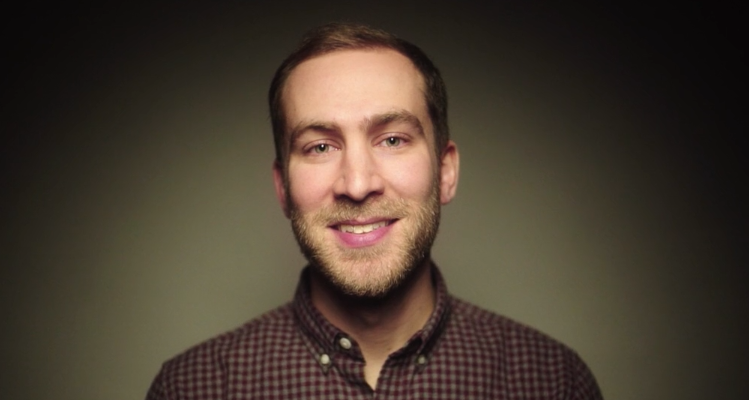 Man standing in front of a wall