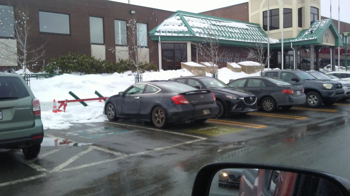SteveDickerNL's tweet photo. WOW. I didn't know Honda made an EV. Especially one that old. 
#nltraffic #entitled 
@Mount_Pearl 
@NLParkingWars 
@RNC_PoliceNL https://t.co/SM5Uf8fq3I