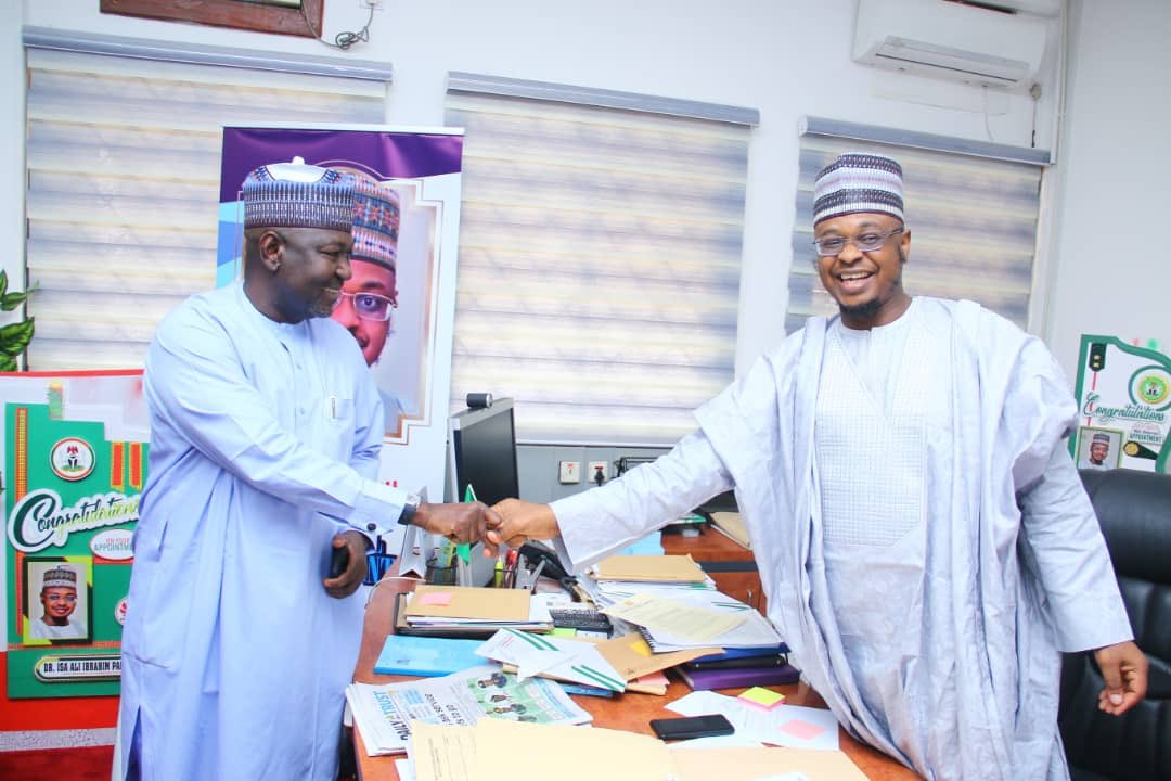 M__Yahas's tweet photo. The Honourable Minister of State Works & Housing, @EngrAbkrD_Aliyu, FNSE and the Honourable Minister of Communications and #DigitalEconomy, @DrIsaPantami during an official visit today at the @FMoCDENigeria Headquarters, Abuja.
#WorksThatWork
#FGatWork https://t.co/O5D8GuB8c3