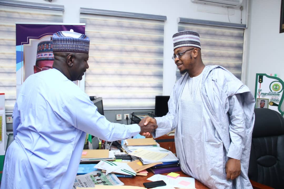 M__Yahas's tweet photo. The Honourable Minister of State Works & Housing, @EngrAbkrD_Aliyu, FNSE and the Honourable Minister of Communications and #DigitalEconomy, @DrIsaPantami during an official visit today at the @FMoCDENigeria Headquarters, Abuja.
#WorksThatWork
#FGatWork https://t.co/O5D8GuB8c3