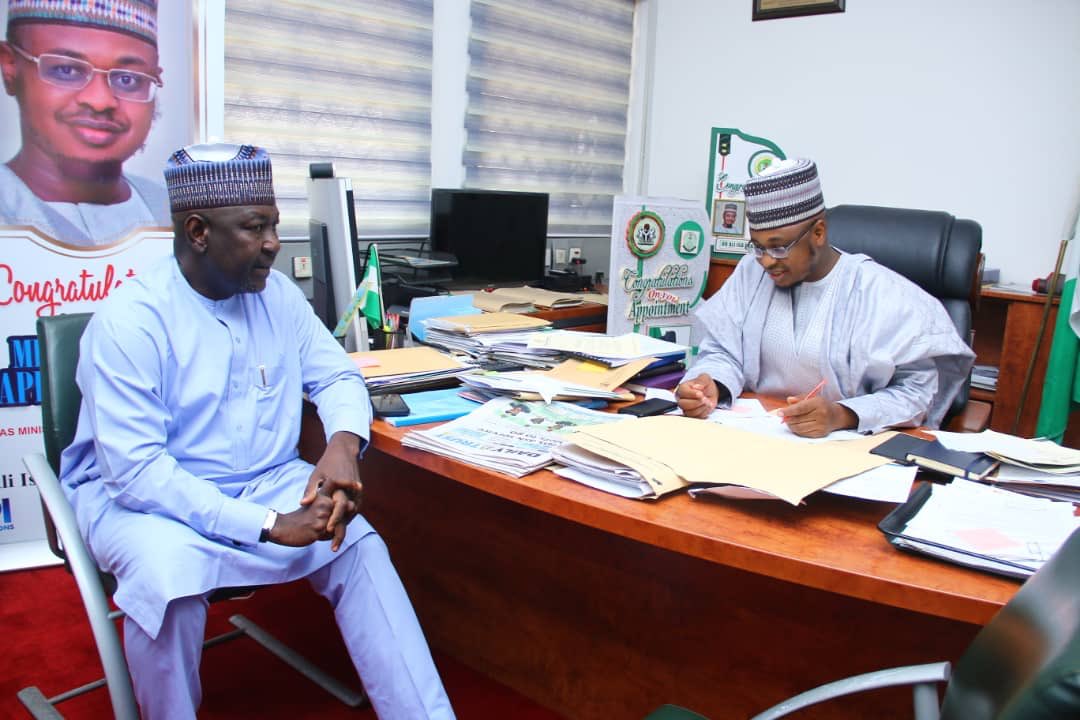 M__Yahas's tweet photo. The Honourable Minister of State Works & Housing, @EngrAbkrD_Aliyu, FNSE and the Honourable Minister of Communications and #DigitalEconomy, @DrIsaPantami during an official visit today at the @FMoCDENigeria Headquarters, Abuja.
#WorksThatWork
#FGatWork https://t.co/O5D8GuB8c3