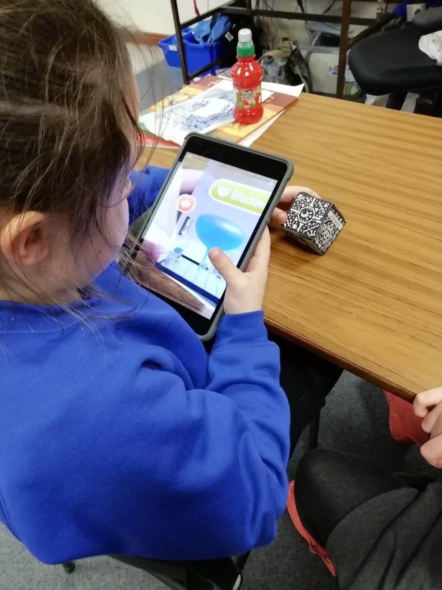 DigiLeadersVPS's tweet photo. Today the digital leaders have been using a merge cube to explore AR/VR. They learned about the inside or a body, the solar system and more! #VPStech https://t.co/bDmkDfVPbN