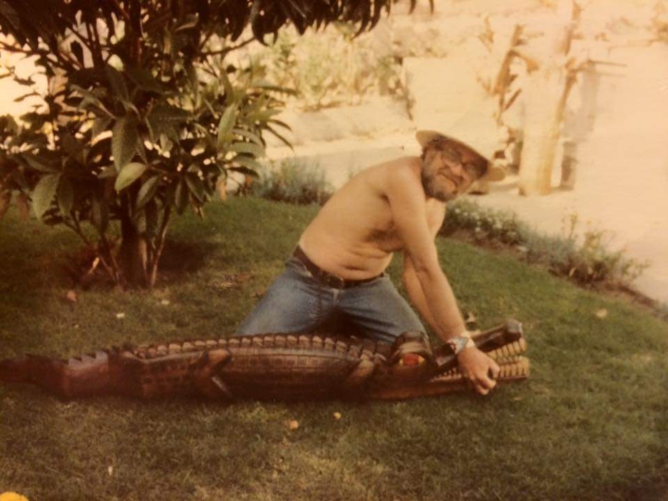 Vickiinmyhead's tweet photo. So this was my dad. Wrestling a balsa wood alligator of his own creation. Kind of funny how I fell in love with wood as a medium for my art. Completely accidental #joebrenner #ecuador #quito #throwbackthursday https://t.co/3aTyotWLvf