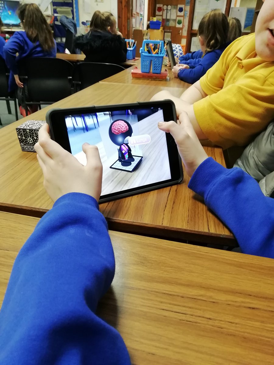 DigiLeadersVPS's tweet photo. Today the digital leaders have been using @MergeVR to explore AR/VR. They learned about the inside of a body, the solar system and more! #VPStech https://t.co/FEruYmyzzI