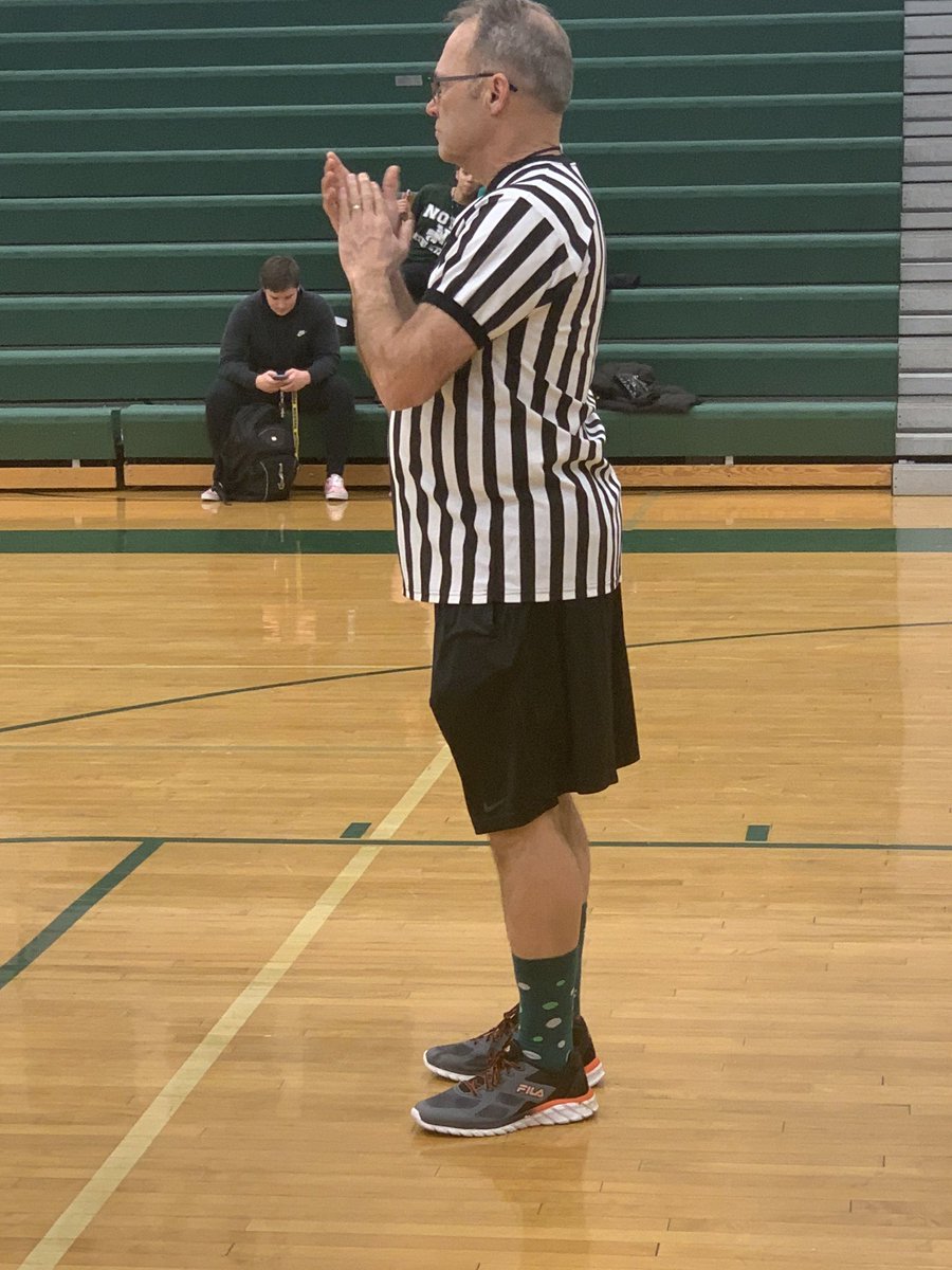 Dr. Matthews wearing mismatched socks.