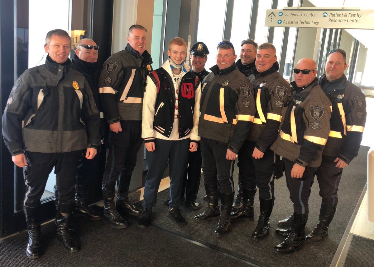 connor standing with members of quincy police special operations unit