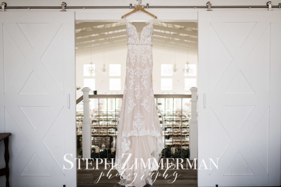 Fairview_Acres's tweet photo. Mrs. Connolly's beautiful gown hanging at the top of the staircase in the Barn. https://t.co/NJzzbpOWhZ