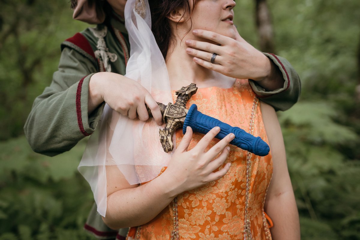 ExploreRealm's tweet photo. "Within my grasp, you shall be overcome by the power of The Drago and The Draken," said the Squire to Tawney the Fair, holding the fantastical sword to her breast. βοΈ
πΈ: @marinagreenpho1
@openbobsbb #kylereviewsit
#ExploretheRealm #ConquerDraken #WieldtheDrago #MedievalCosplay https://t.co/qtX1Wv7ON2