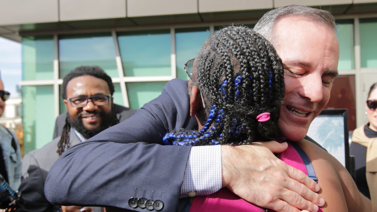 Mayor Garcetti hugging a formerly homeless woman