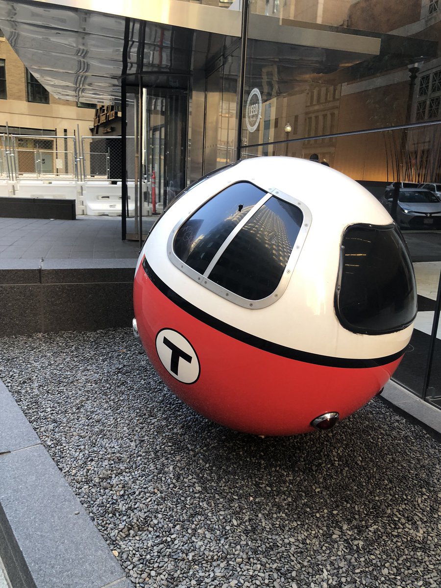 Sphere painted like an MBTA Red Line car