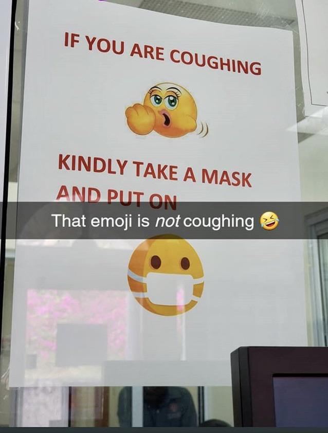 "If you are coughing" [VERY suggestive emoji that is NOT coughing, but someone mistook it for that] "kindly take a makes and put it on" [face with mask emoji]. Poster at a school health clinic.