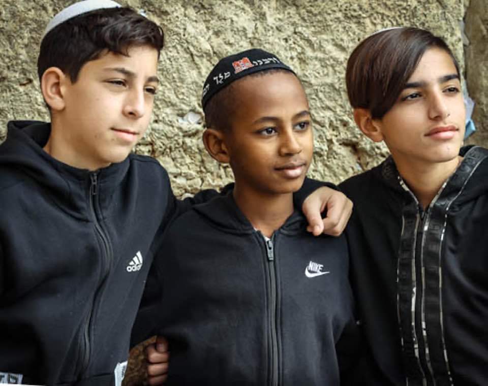 These are 3 Jewish boys at the Western Wall at Jerusalem's Temple Mount. Apartheid? I don't think so.
