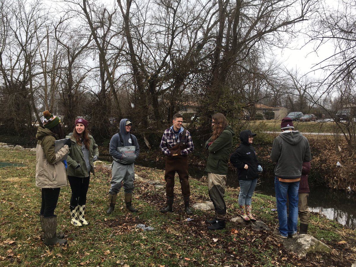 streambug's tweet photo. Stream Ecology class @CNASatMSU went out to urban Fassnight Creek today to learn some #FluvialGeomorphology from @MSUggp Pavlowsky students. Survey gear, ‘river booty’ (incl #BobSeeger CD), and snow! https://t.co/yRED4f5jPO