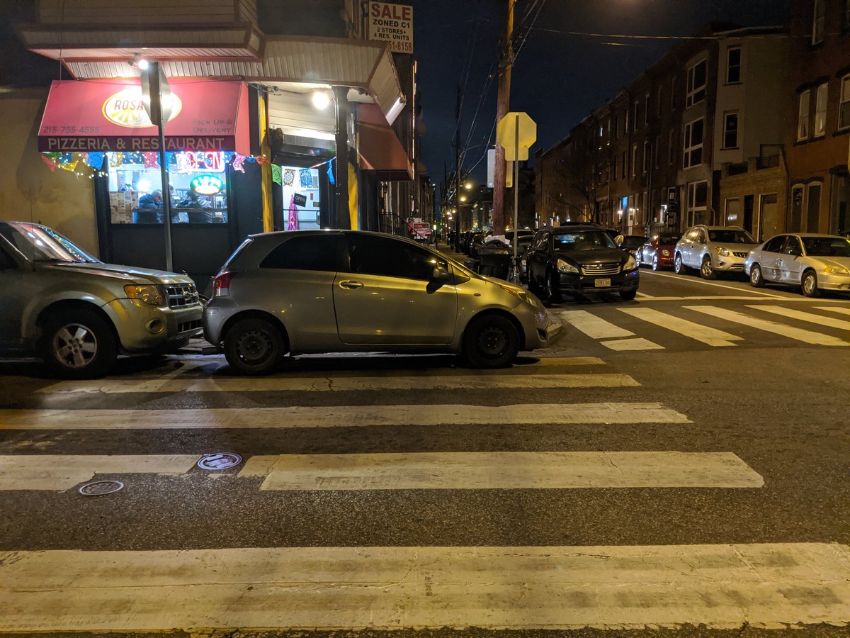 dmtrubman's tweet photo. If public spaces and sidewalks are truly for everybody, this can't be acceptable. Everyday employees of @PhilaParking and @PhillyPolice walk by examples like this of cars parked entirely in the cross walk and do nothing. Words are nice, but meaningless if not backed up. #notaspot https://t.co/obnBn5X7GP