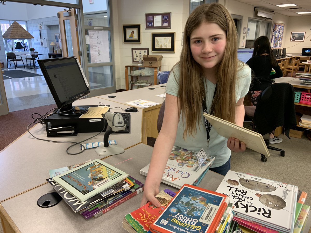 Check out our awesome G-Tech Members running the circulation desk at the library! They’re checking books in/out, assisting students and doing it all with a smile! #cbsdtech #gtech 💻📚