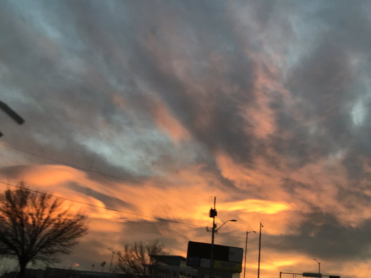 Light orange and yellows on clouds