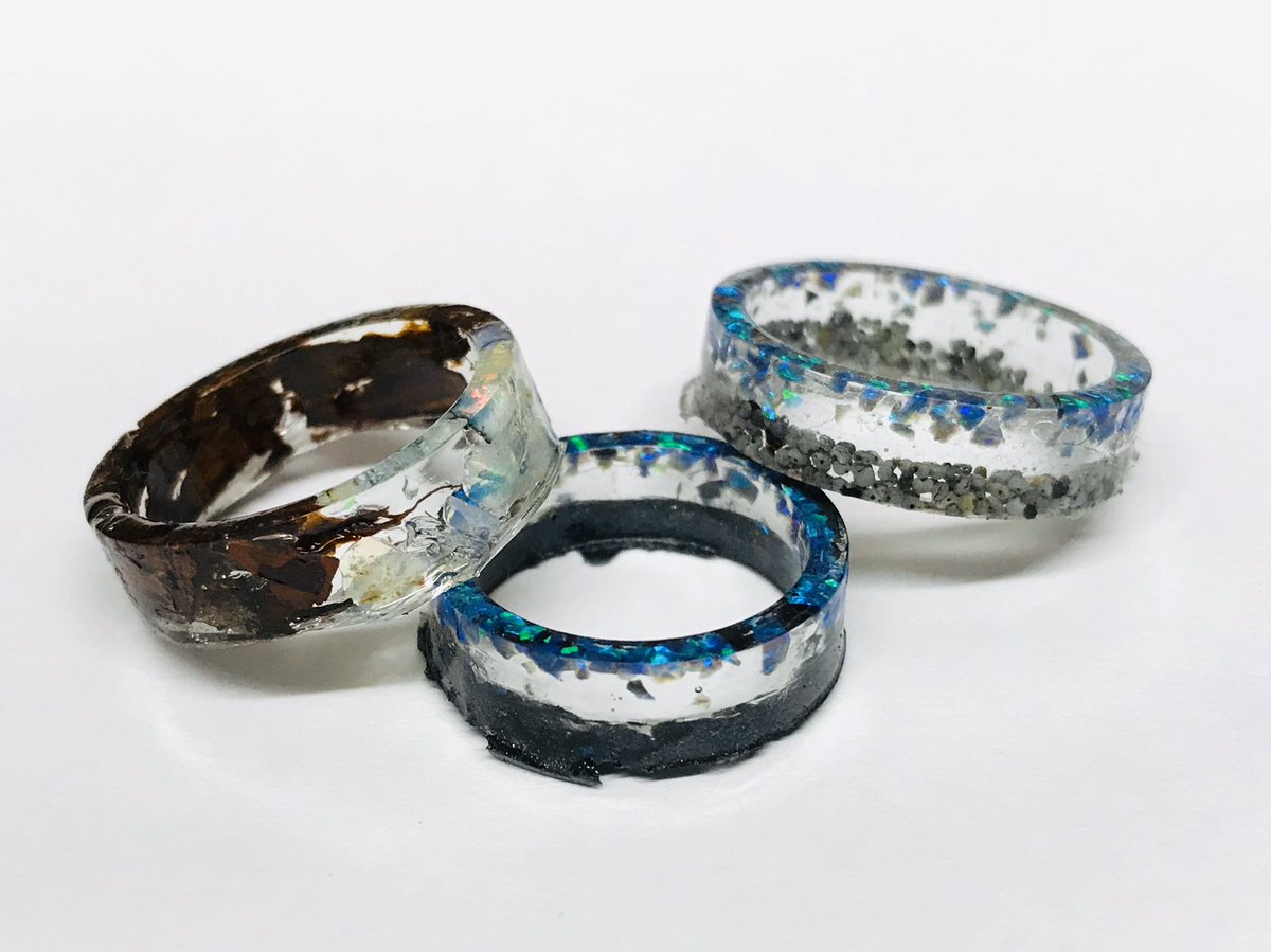 Haven't sanded them yet, but these are some of the new designs, all made with real opal and natural ingredients like tree bark, poppy seed, and charcoal. Oof, that charcoal is hard to work with! Came out well though 😊💍