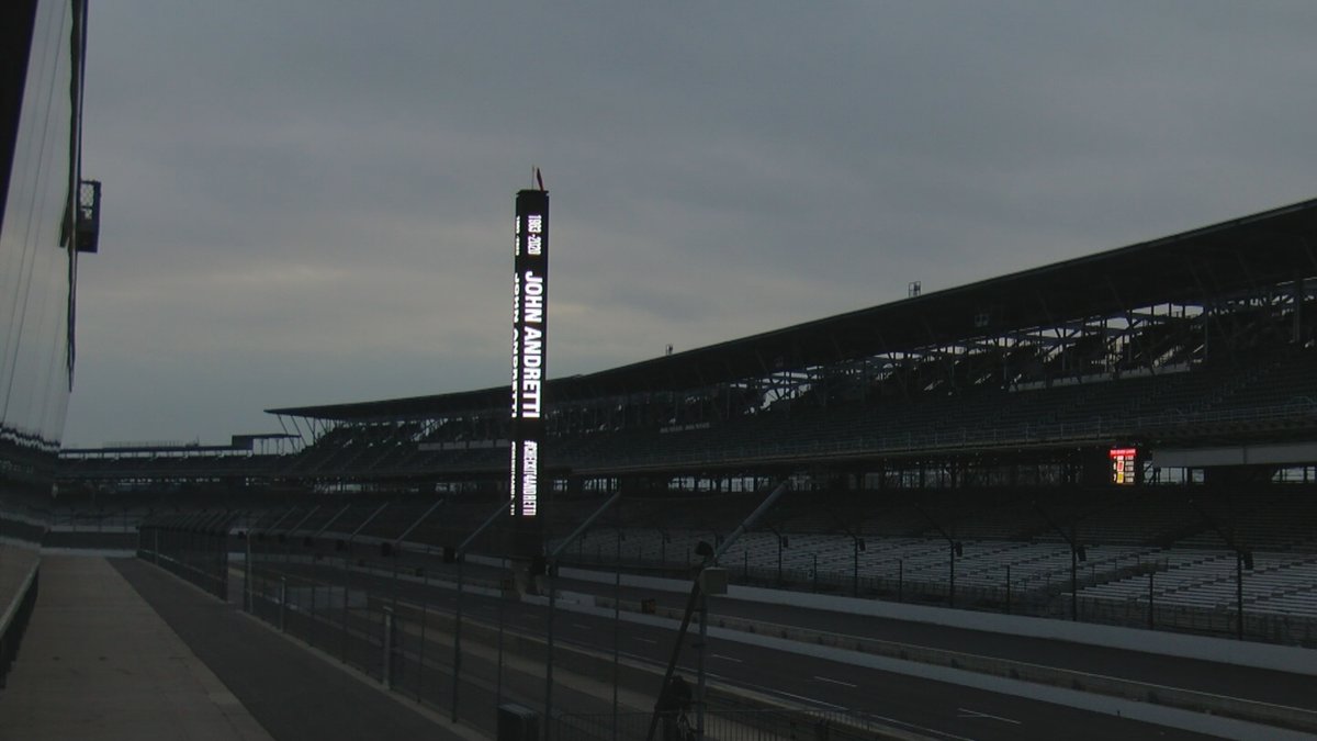 WISHNews8's tweet photo. The scoring pylon at the Indianapolis Motor Speedway honored John Andretti Thursday night after the news of the famed driver's death. Andretti's name and the years 1963-2020, along with #checkit4andretti were brightly displayed at the track. https://t.co/BDJAQc3jZ7