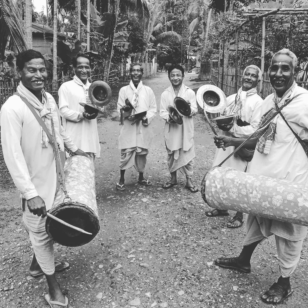 For starters, here is a team of people performing Bordhol (Big Drum) in my village There are multiple such drums to perform in different Puja and other festivals.