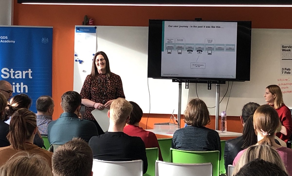 Lesley at the front of the room