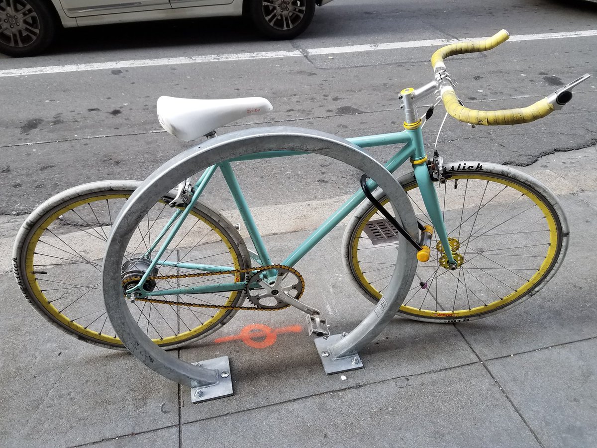 AbramClark's tweet photo. I love the elegance and years of grime on this well loved machine parked at Bush &amp; Montgomery, FiDi SF https://t.co/z8UUernltr