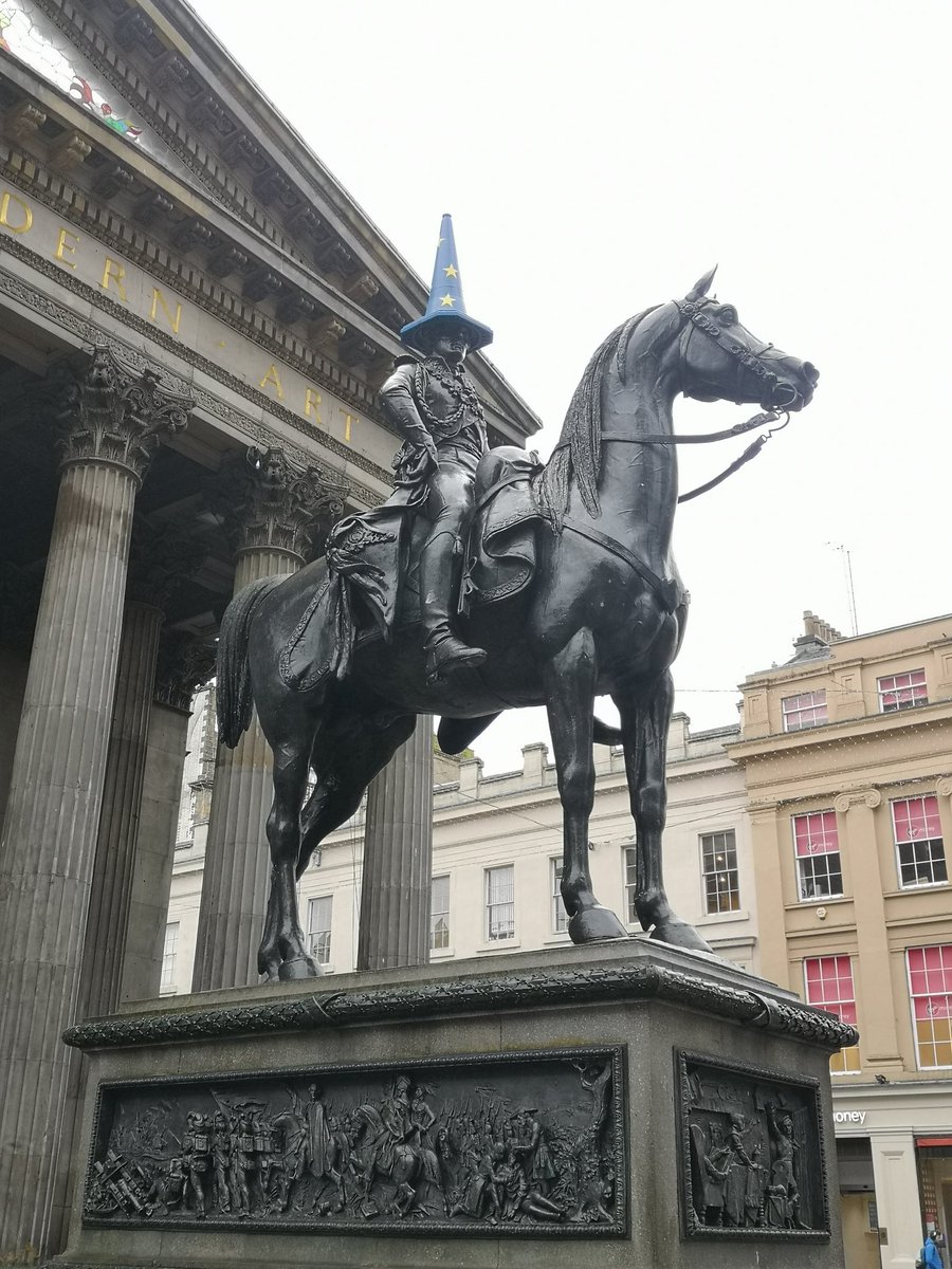 The Duke of Wellington statue in Royal Exchange Square. His traffic cone is like an European flag