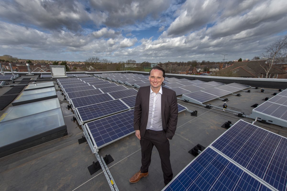 Solar panel array at Fullhurst with Cllr Clarke