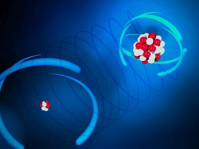 Artists’ impression of the ion pair: laser-cooled Be⁺ (b.l.) and highly charged Ar¹³⁺ (t.r.).