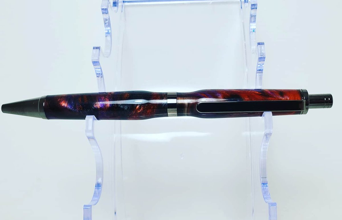 Made that galaxy blank into a pen.  The kit is a pen state ind slimline pro click gunmetal. #odinswoodshop #alumilite #alumiliteresin #alumilitedyes #casterschoice #turnerswarehouse #handmade #pen #penstateindustries #epoxy #epoxyresin