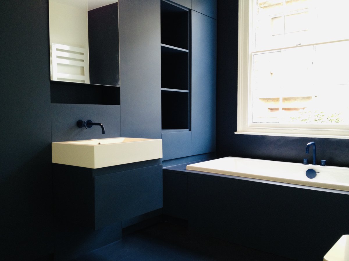PidgeonLtd's tweet photo. Kentish Town Bathroom by DPB - MDF units, decorated. Floor, bath panelling and wall clad in  blue rubber! Interesting! https://t.co/jvACCGYgrN